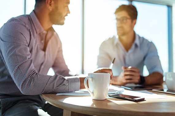 Two people having a Strategy Meeting