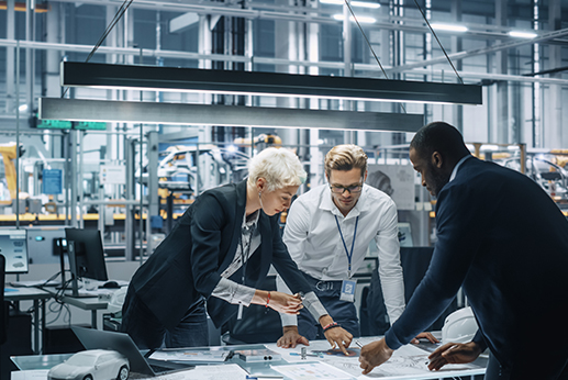 group of engineers working in office